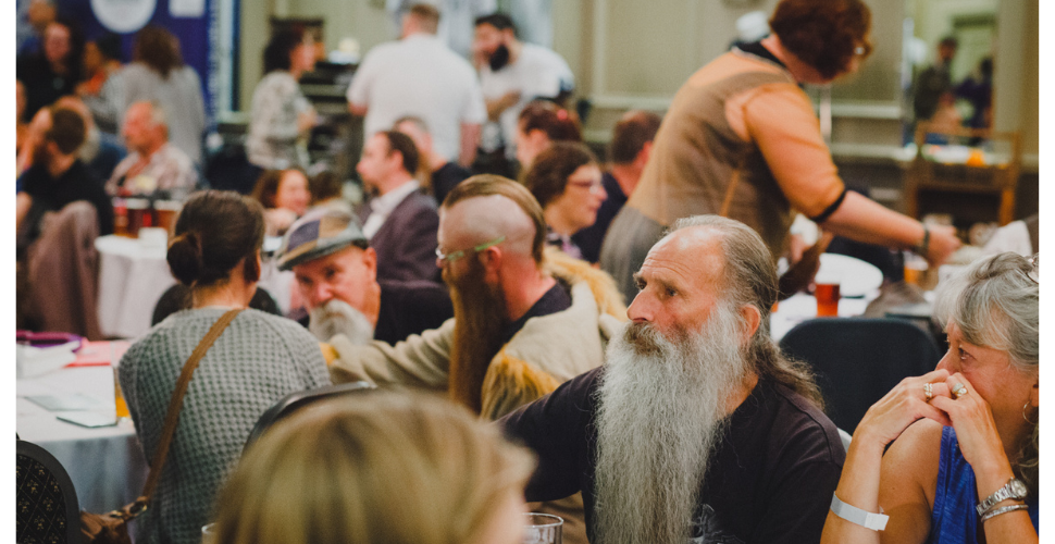 A crowd of people with beards